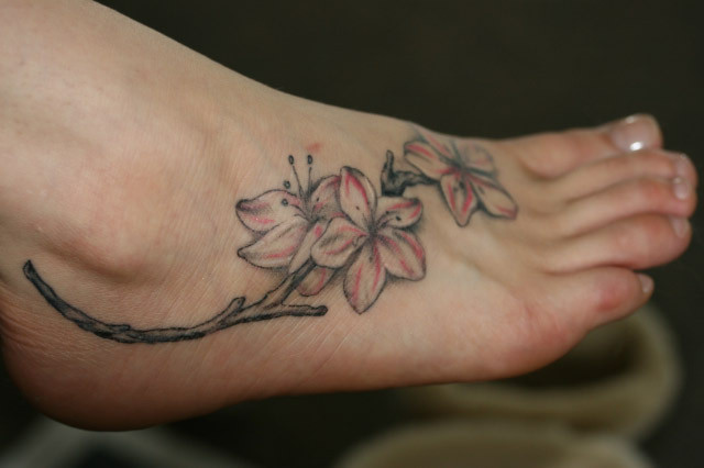 flower and star tattoos on foot. You are here: Home » Flower Foot Tattoo Design for Younger Girls